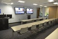 Business student meeting Seminar room conference hall and Seats with Blank TV screens at the university Royalty Free Stock Photo