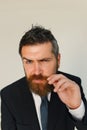 Business, style and confidence concept. Man with thick beard