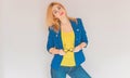 Business style, woman in blue jacket, yellow top Royalty Free Stock Photo