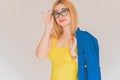 Business style, woman in blue jacket, yellow top Royalty Free Stock Photo