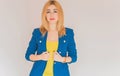 Business style, woman in blue jacket, yellow top Royalty Free Stock Photo