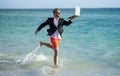 business success. Beach productivity for the director businessman. Businessman director running at the beach. director Royalty Free Stock Photo