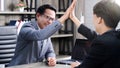 Business success corporate Asian businessmen giving hi five after success job with partner Business team clapping hand with