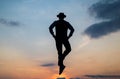 business success. freedom. personal achievement goal. man silhouette jump on sky background.