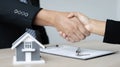 Business success, Real estate agents and customers shake hands