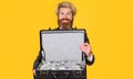 Business success. Smiling businessman with briefcase full of money. Lending service. Wealth and rich. Royalty Free Stock Photo