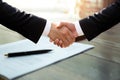 Business successful hand shaking hands over agreement form Royalty Free Stock Photo