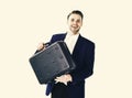 Business succsses. Business man with briefcase standing on white background. Royalty Free Stock Photo