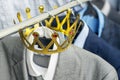 Business suit with a gold crown hanging on a hanger. Clothing is a successful person. Business concept. Metaphor