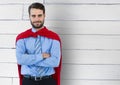 Business Superhero against wood Royalty Free Stock Photo