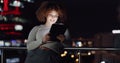 Business tablet, night balcony and woman reading positive social network feedback, customer experience or ecommerce