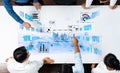 Business Team Analyzing Data Insights on Interactive Digital Table with Graphs, Charts, and Binary Code Representations Royalty Free Stock Photo
