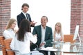 Business team applauding business partners after signing the contract. Royalty Free Stock Photo