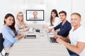 Business team attending video conference Royalty Free Stock Photo