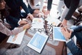 Business team brainstorming. Marketing plan researching. Paperwork on the table, laptop and mobile phone Royalty Free Stock Photo