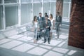 Business team, businesspeople group walking at modern bright office interior Royalty Free Stock Photo