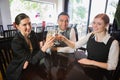 Business team celebrating a success with champagne in restaurant Royalty Free Stock Photo