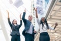 Business team celebrating success. Business people throwing paperwork to the sky celebrate after project is done successfully