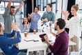 Business team celebrating success together on workplace in office Royalty Free Stock Photo