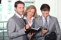 Business team checking diary Royalty Free Stock Photo