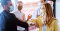 Business team closing deal by using the corona bump instead of handshake Royalty Free Stock Photo