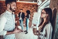 business team with coffee cups talking at office