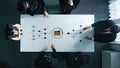 Business team collaboration discussing data analysis at modern office table with technology graphics and information Royalty Free Stock Photo