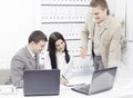 Business team discussing business issues,sitting behind a Desk Royalty Free Stock Photo