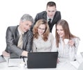 Business team discussing business issues sitting behind a Desk Royalty Free Stock Photo