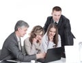 Business team discussing business issues sitting behind a Desk Royalty Free Stock Photo