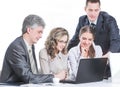 Business team discussing business issues sitting behind a Desk Royalty Free Stock Photo