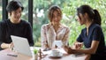 Business team discussing theirs work and looking on the paper in meeting room Royalty Free Stock Photo