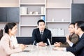 Business team discussion work in office,People sharing ideas and discussing project,Brainstorm meeting concept Royalty Free Stock Photo