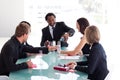 Business team drinking champagne in a meeting Royalty Free Stock Photo