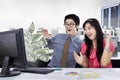 Business team earning money online in the office Royalty Free Stock Photo