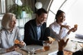 Business team of happy workers relaxing during lunch break Royalty Free Stock Photo