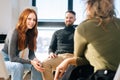 Business team having brainstorming meeting to plan and achieve goal in modern office near window. Royalty Free Stock Photo