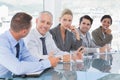 Business team having conversation at conference Royalty Free Stock Photo