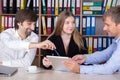 Business Team having friendly Discussion at wooden Office table Royalty Free Stock Photo