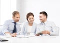 Business team having fun with tablet pc in office Royalty Free Stock Photo