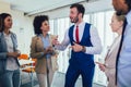 Business team having a meeting standing in the office. Selective focus Royalty Free Stock Photo