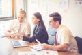 Business team having a meeting using laptop during a meeting and present. Royalty Free Stock Photo
