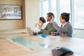 Business team having video conference with another business team Royalty Free Stock Photo