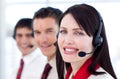 Business team with headset on smiling Royalty Free Stock Photo