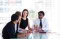 Business team interacting to each other in office Royalty Free Stock Photo
