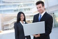 Business Team With Laptop (Focus on Man) Royalty Free Stock Photo