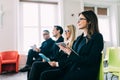 Business team listen seminar presenter at corporate conference speech workshop discussion in hall during company training event