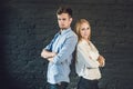 business team male and female formed of young businessmen standing over a dark background Royalty Free Stock Photo