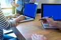 business team man and woman work with laptop on wood table Royalty Free Stock Photo