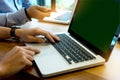 Business team man and woman work with laptop on wood table Royalty Free Stock Photo